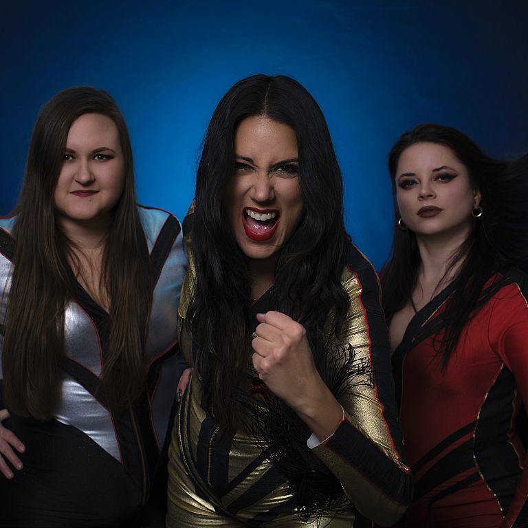 The Gems   The Gems, a Swedish rock trio formed in early 2023, consist of former Thundermother members Guernica Mancini (vocals), Emlee Johansson (drums), and Mona 
