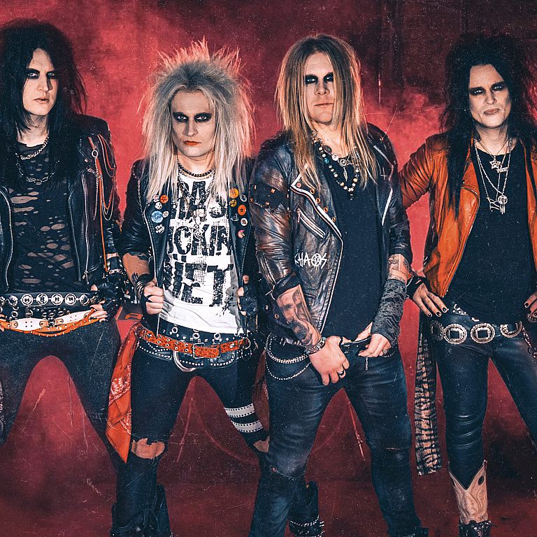 Crashdiet    CRASHDÏET – Sweden’s Glam Metal Survivors   Sweden’s CRASHDÏET are pioneers of glam and sleaze metal, a band forged through turbulence, tragedy, and sheer determination. With a career marked by line-up changes, personal losses, and hi